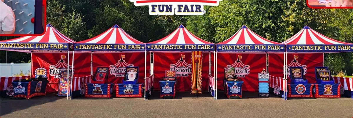 Five Fantastic Fun Fair carnival tents set up with games